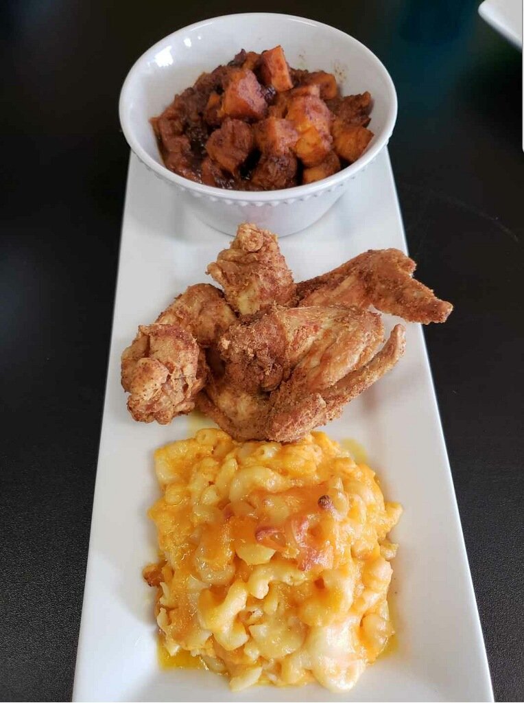 Pictured here is Gee Gee's mac n cheese and fried chicken